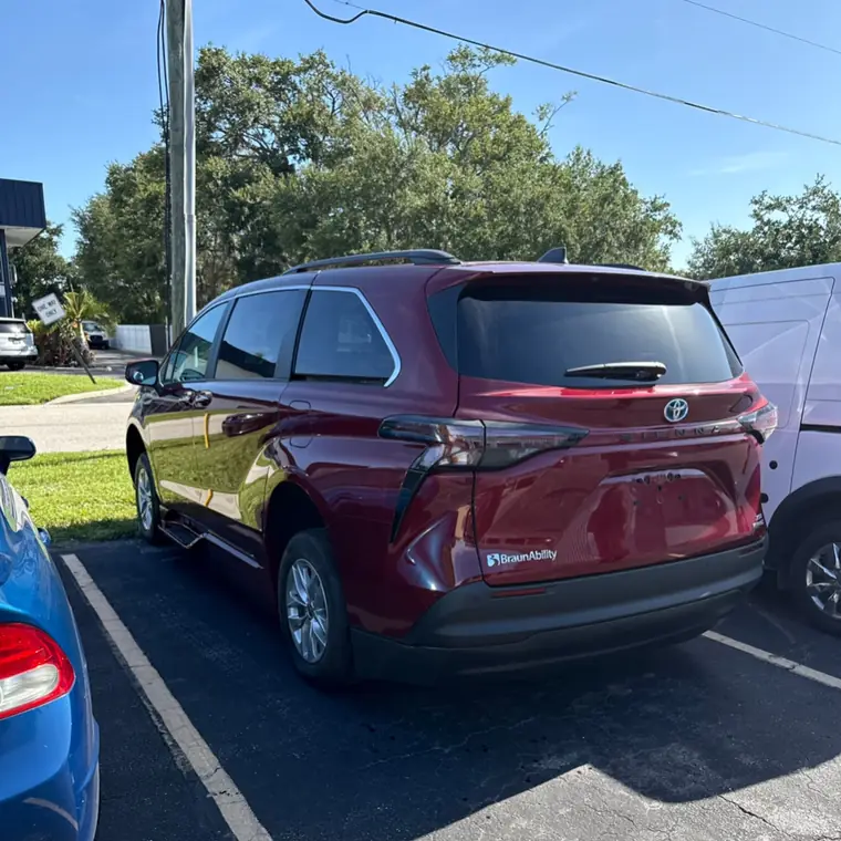 The same Toyota Sienna after panel repair and paint