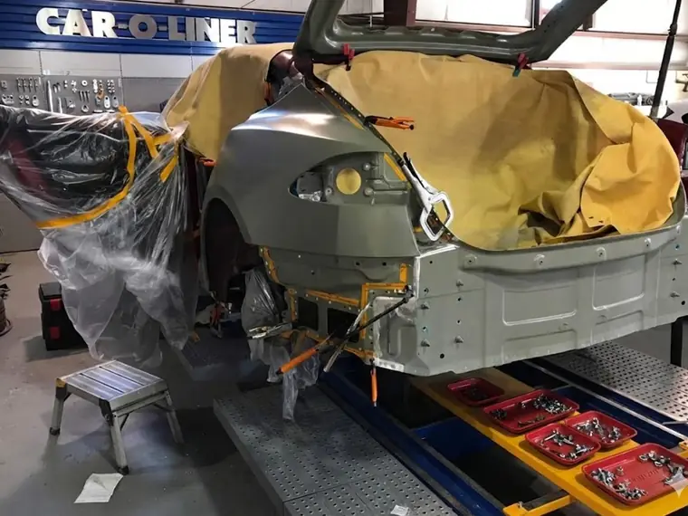 An electric vehicle in the repair bay